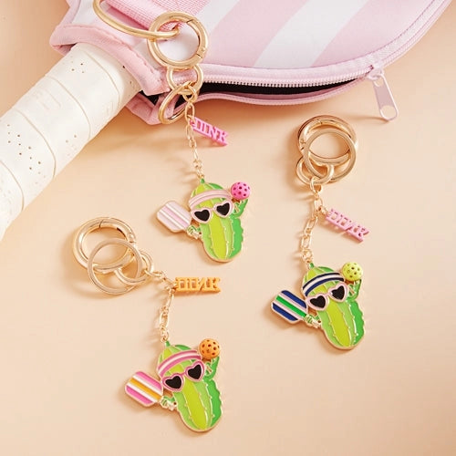 Keychain- Pickle Playing Pickleball with a Dink Charm