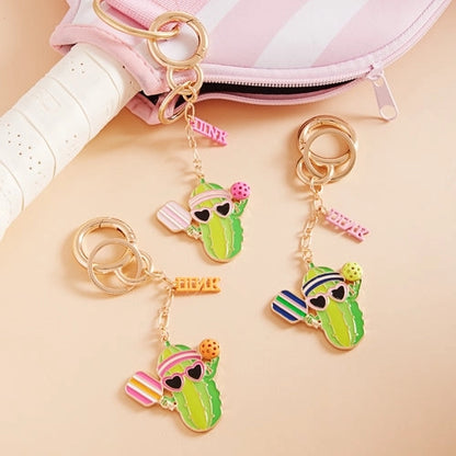 Keychain- Pickle Playing Pickleball with a Dink Charm