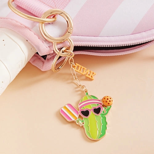 Keychain- Pickle Playing Pickleball with a Dink Charm